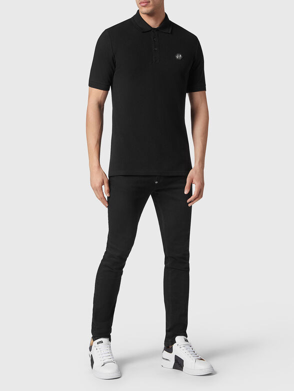 STARS black polo shirt with contrasting print - 4