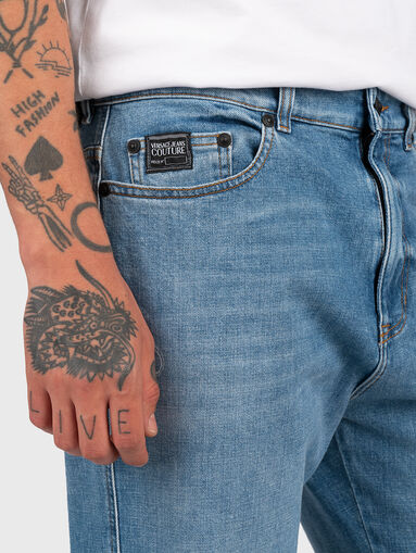  Light blue jeans with print - 3