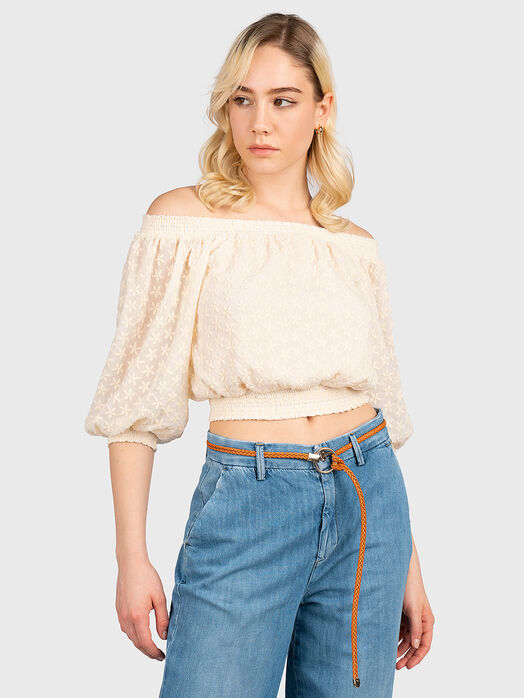 Blouse with elastic and floral motifs