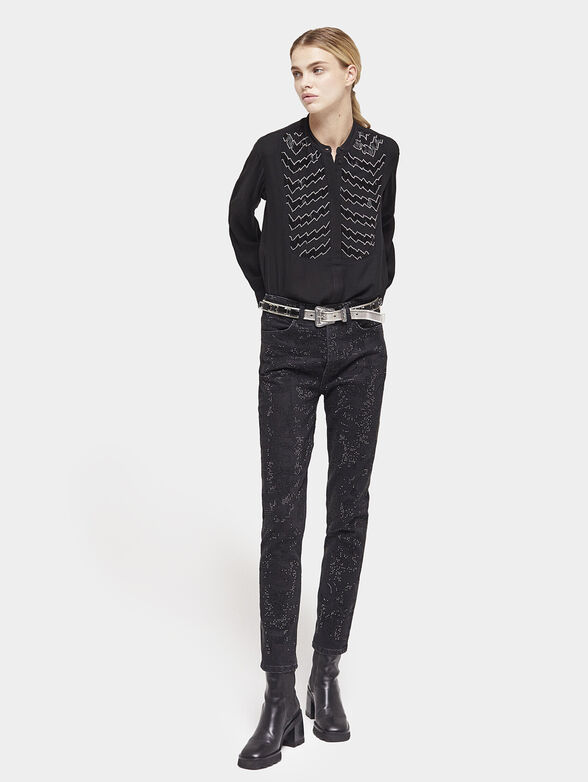 Black jeans with shiny appliqués - 1