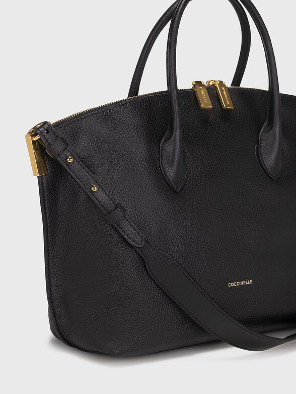 Leather bag with metal accents - 5