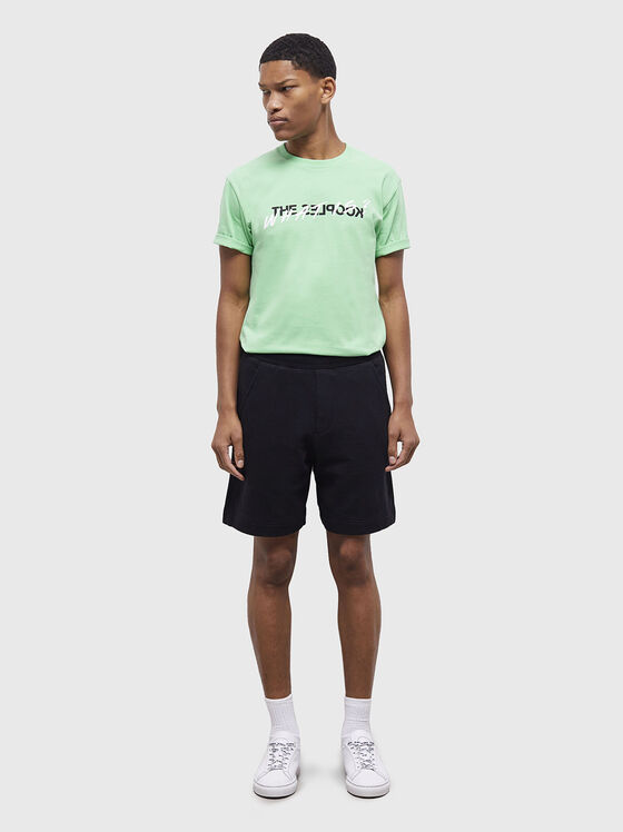 Black cotton shorts with logo detail - 1