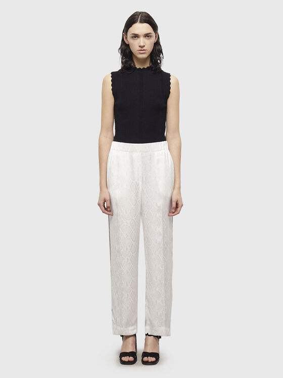 SEUL trousers with snake print - 1