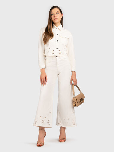 Flared trousers with embroidery - 5