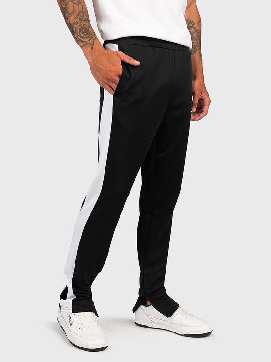 Pantaloni SANDRO negri cu bordură contrastantă - 1