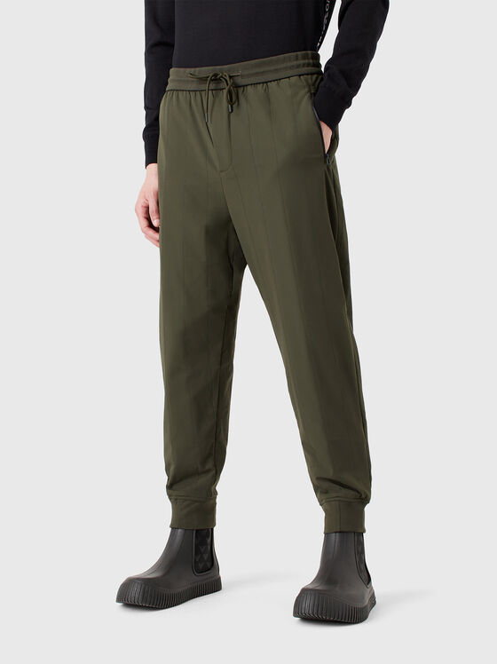 Trousers with side pockets and logo - 1