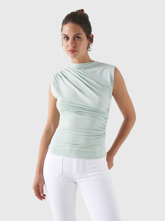 Pale green top with ruffled detail - 1