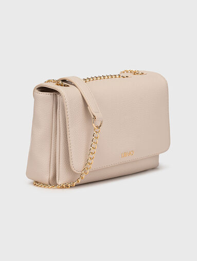 Black bag with grained texture and logo  - 5