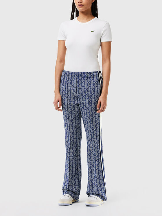 Sports trousers with monogram print  - 1