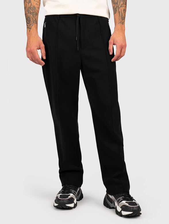 Straight pants in black color - 1