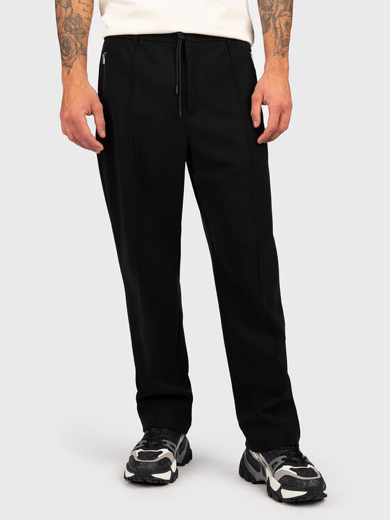 Straight pants in black color - 1