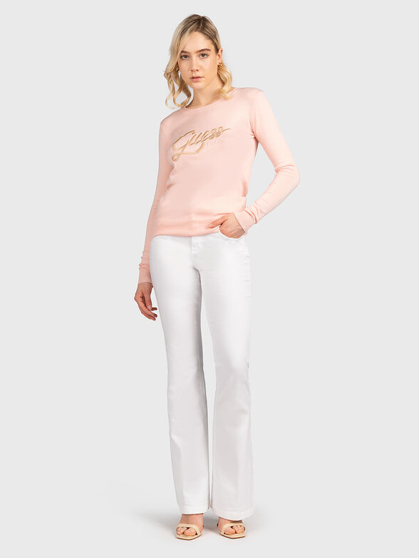 Pink sweater with gold-colored logo element - 2