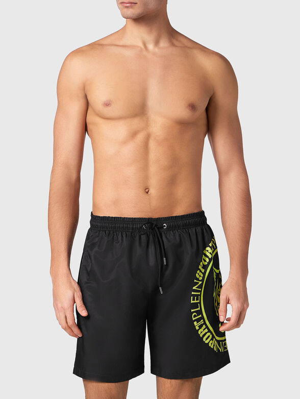 Black beach shorts with logo accent - 1