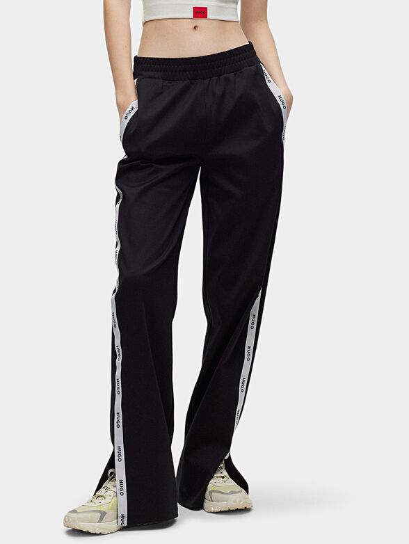 Sports pants with contrasting stripes - 1