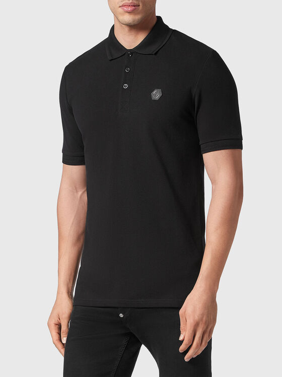 STARS black polo shirt with contrasting print - 1
