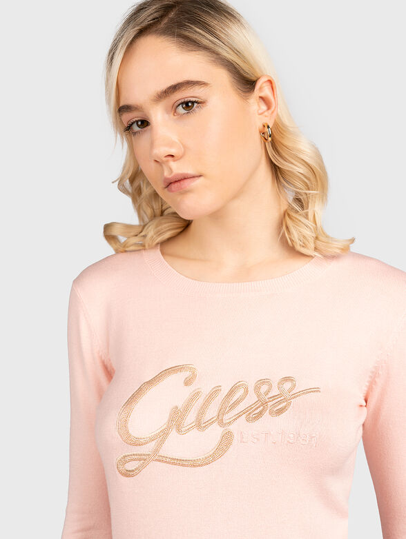 Pink sweater with gold-colored logo element - 4