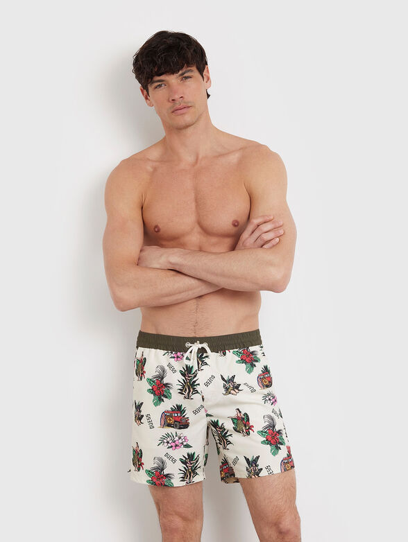 Beach shorts with floral print - 1