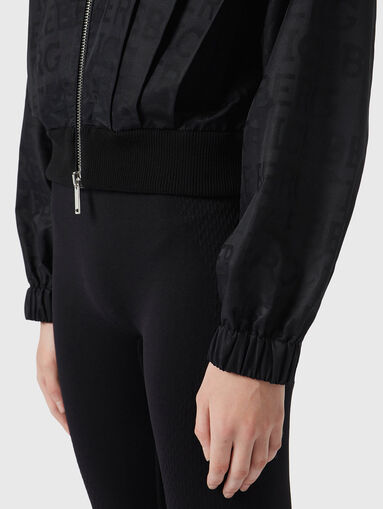 Black jacket with logo accent - 4
