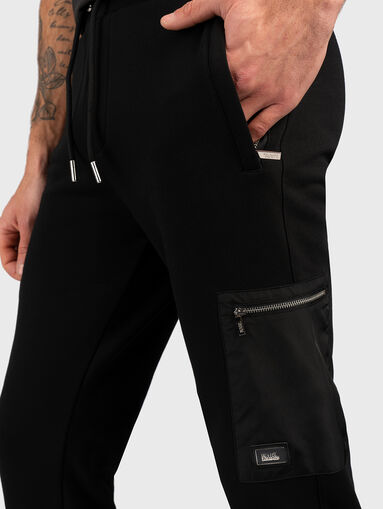 Zip-detailed black sweatpants - 4