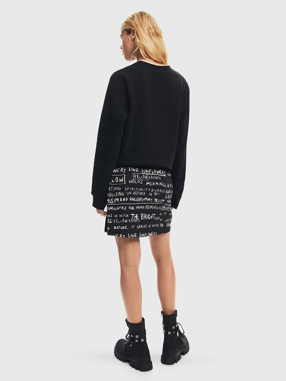 Black mini skirt with contrast print  - 2