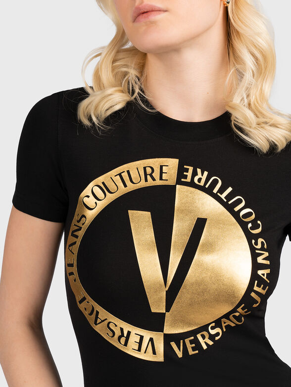 Black T-shirt with gold-colored logo accent - 4