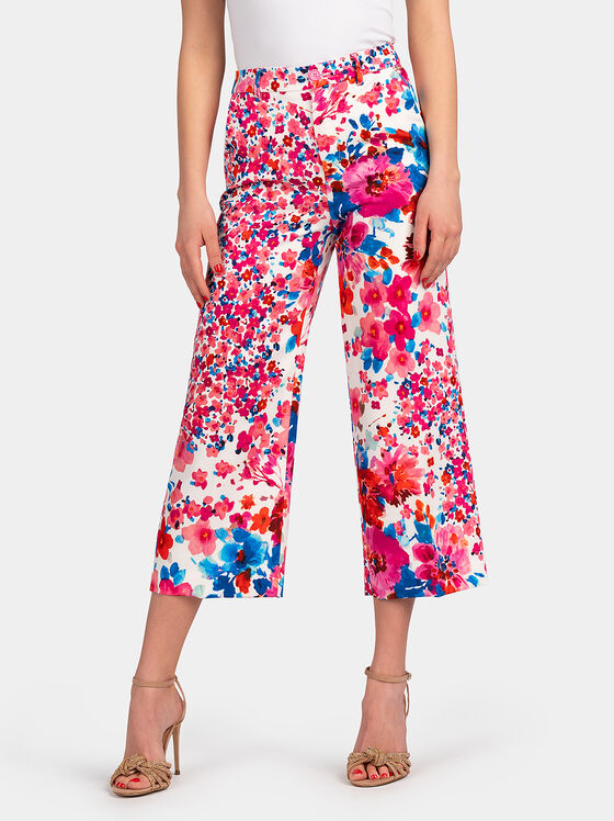 Cropped trousers with floral motifs - 1
