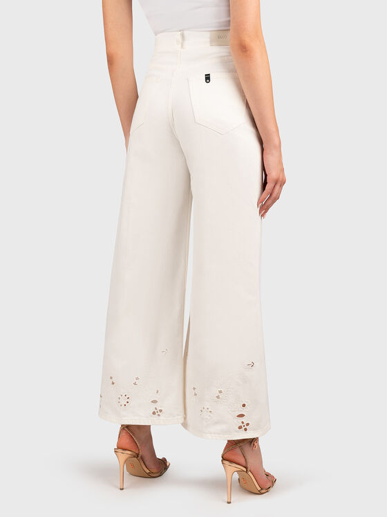 Pantaloni evazați cu broderie - 2