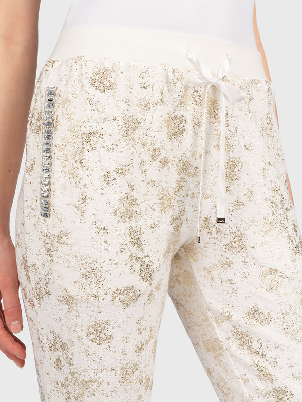 Sports trousers with shiny accents - 3
