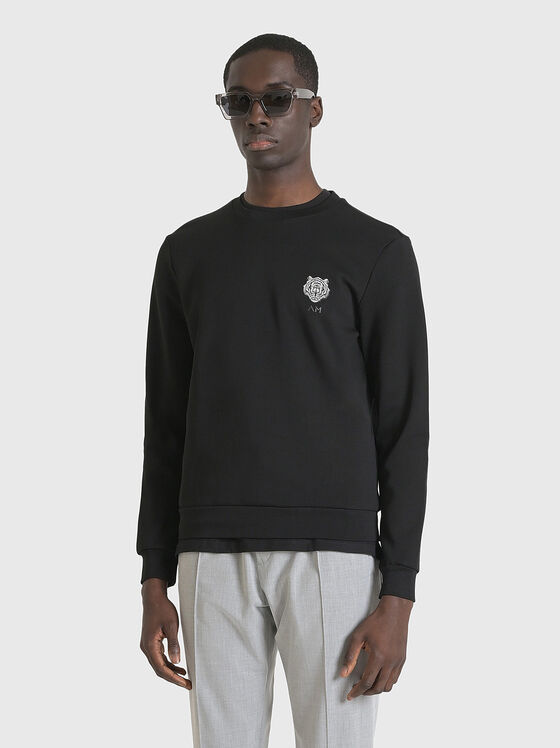 Sweatshirt in black with logo detail - 1