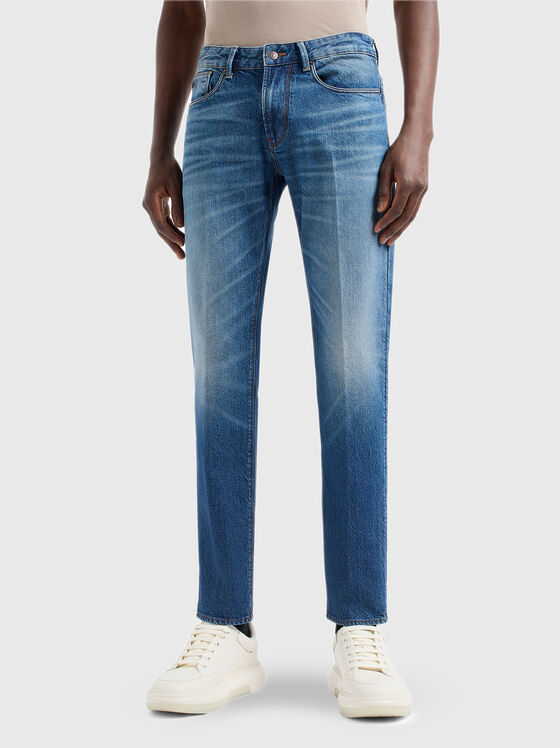 Light blue jeans with washed effect - 1