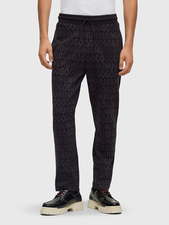 Sports trousers with monogram logo print - 1
