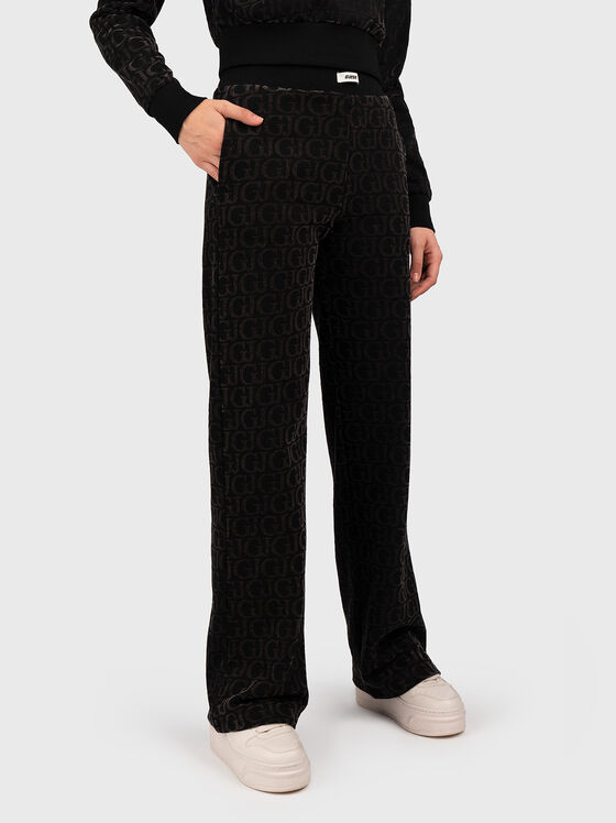 Sports trousers with monogram print  - 1