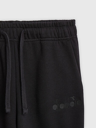 Sports pants in black with logo element - 5