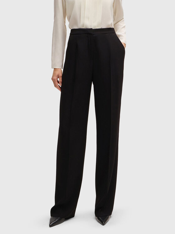 Black trousers wit wide legs - 1