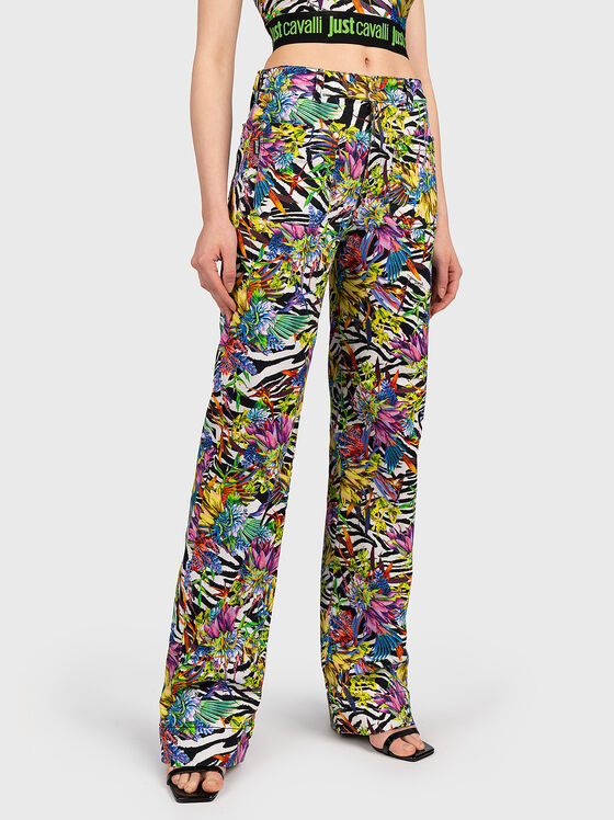 Jeans with multicoloured print - 1