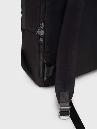 Black backpack with metal logo accent - 4