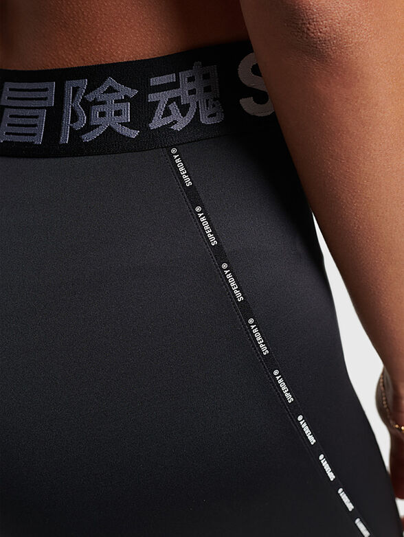 TRAIN black sports leggings with logo detail - 5
