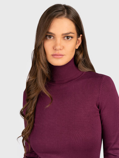 Turtle neck sweater with buttons on the sleeves - 5