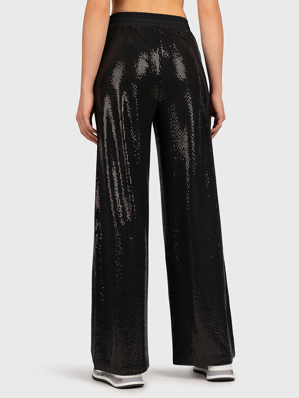 Trousers with appliquéd shiny details - 2