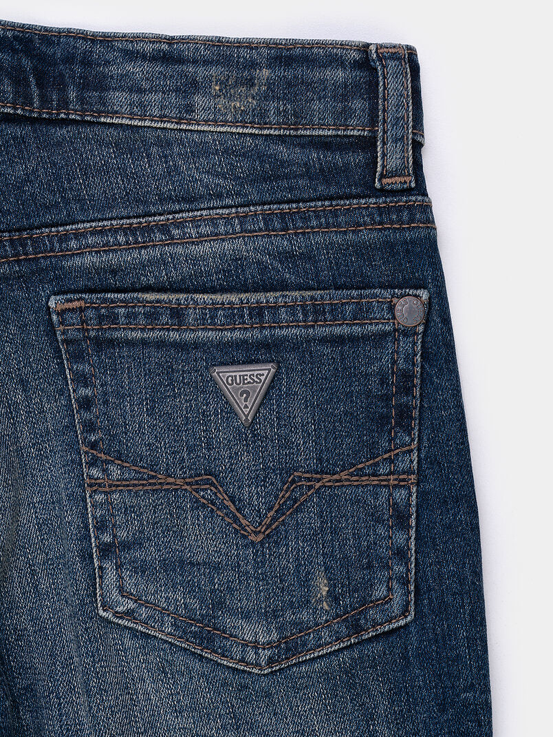 Blue jeans with distressed effect - 3