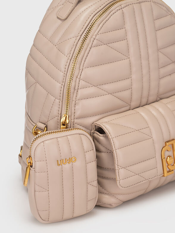 Backpack is beige color  - 4