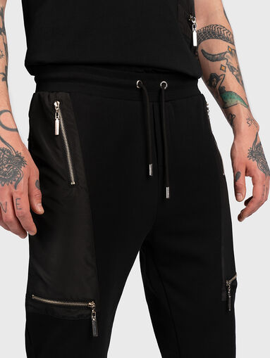 Black pants with accent pockets - 4
