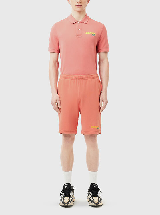 Pantaloni scurți sport în culoarea piersicii - 1