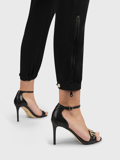 Pants with zips on the legs - 4