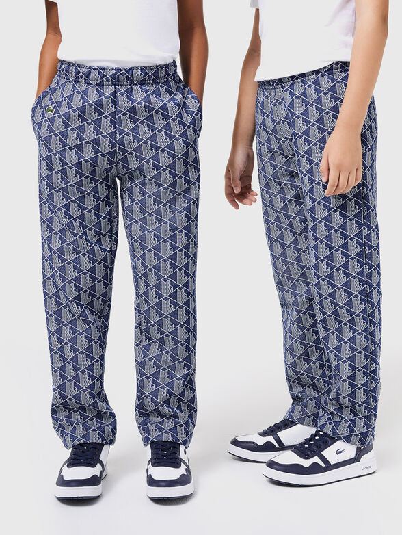 Sports trousers with geometric pattern  - 3