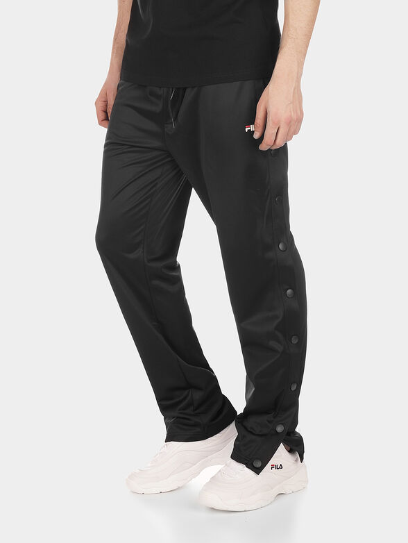 NAOLIN Track pants with lateral buttons - 1