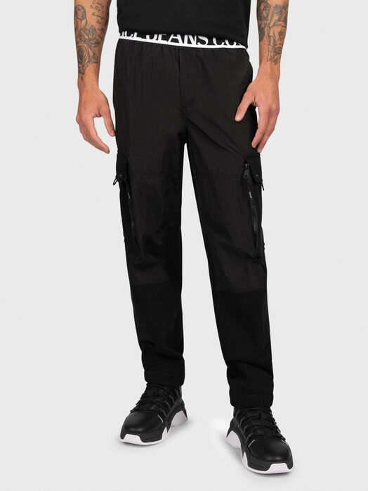 Black track pants with logo detail