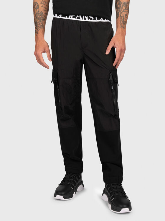 Black track pants with logo detail - 1
