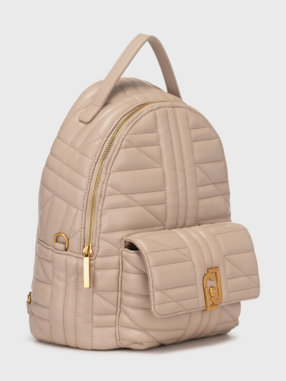 Backpack is beige color  - 3