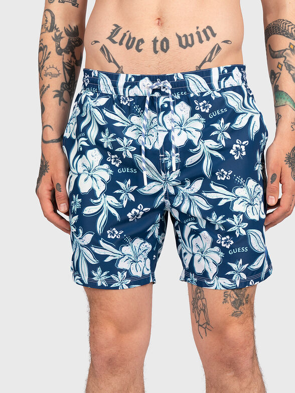 IBISCUS blue swimtrunks with floral print - 1